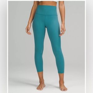 Size 4 aqua colored lululemon leggings!